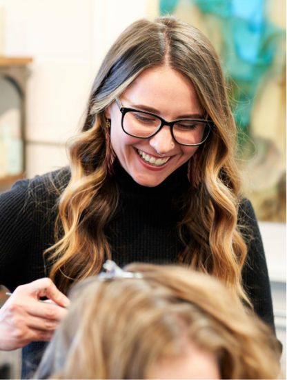 Hair stylist at Grand Salon in Denver