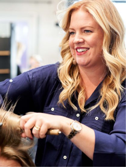 Hair stylist at Grand Salon in Denver