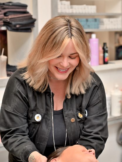 Hair stylist at Grand Salon in Denver