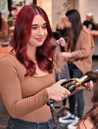 Hair stylist at Grand Salon in Denver